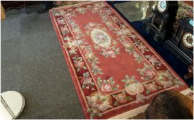 Good Quality,  Red Tones In Colour Rug. 37 Inches Wide by 75 Inches In Length.