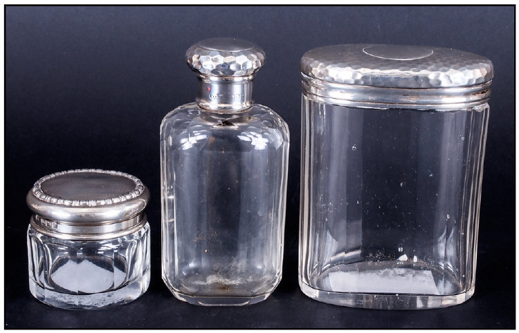 A Matching Set Of Silver Topped & Glass Ladies Trinket Bottles, with planished finish. Hallmarked