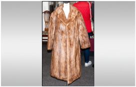 Ladies Full Length Light Brown Mink Coat. Fully Lined. Collar with revers. Label inside reads `