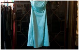 Coast Authentic Ladies Dress Size 10. Turquoise with white beading design, long and sleeveless A
