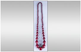 Bead Necklace Long Strand Of Cherry Amber Coloured Graduated Beads, Early/Mid 20thC