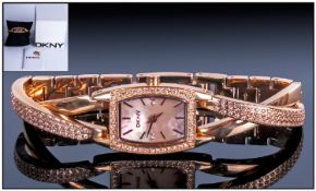 DKNY Ladies Rose Gold Plated Wrist Watch. Model No.111204. Complete with Box and Papers. As New
