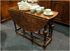 Oak Drop Leaf Gate Table, Turned Supports. Top 42x41``. 28`` in height.