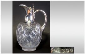 Victorian Silver Mounted and Cut Glass Claret Jug of good quality. Hallmark Birmingham 1893. Makers