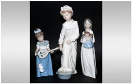 Nao By Lladro Set Of Three Figures, `Nina Mandolina` (Nina Mandolin), `Girl Washing Feet` plus one