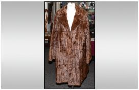 Ladies Three Quarter Length Squirrel Coat, fully lined, slit pocket. Collar with revers. Hook &