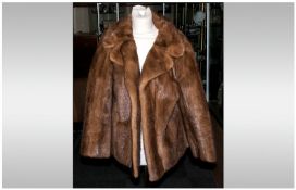 Ladies Light Brown Mink Jacket, Fully lined, collar with revers. Label reads `Harry Barnado, model,