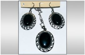 Black Agate Pendant and Earrings Set, an oval cabochon black agate, 1.25 inches high, set in a wave