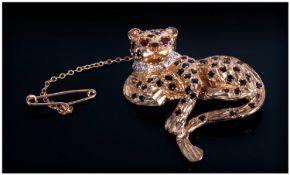 An English 9ct Gold Figural Brooch, In The Form of a Leopard, Set with Diamonds, Sapphires and Ruby