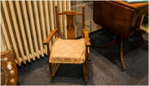 Rush Seated Art Nouveau Childs Rocking Chair in oak with pretty inlaid central roundel of a young