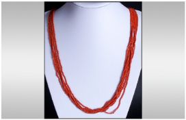 Coral Multistrand Necklace, six rows of tiny rondelle beads of coral, drawn together with silvered