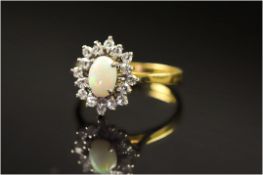 18ct Gold Diamond Dress Ring, Set With A Central Opal Surrounded By Round Cut Diamonds, Fully