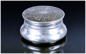 A Fine Silver and Tortoiseshell Circular Lidded Pill Box. The Tortoiseshell Top Inlaid with a Silver