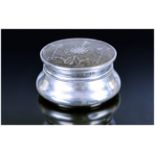 A Fine Silver and Tortoiseshell Circular Lidded Pill Box. The Tortoiseshell Top Inlaid with a Silver