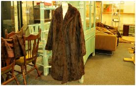 Ladies Dark Brown Squirrel Coat, Fully lined, Hook & Loop fastening. Cuff Sleeves. Label inside