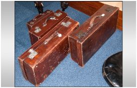 Collection Of Early 20thC Brown Leather Suitcases, Largest 26x13x6½ Inches Together With A Small Non