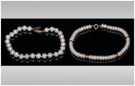 Ladies Fine Cultured Pearl Bracelets, with 18ct Gold Clasps. Marked 750. ( 2 ) In Total. Each 7