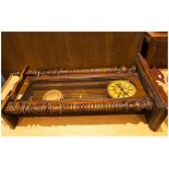 Vienna Wall Clock In Stained Walnut Case, with cellaloid chapter ring, long drop pendulum, fancy
