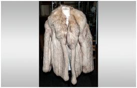 Ladies Blue Fox Fur Jacket, Fully lined. Collar with revers. slit pockets, approximate size 12.