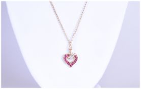 9ct Gold Heart Shaped Pendant Set With Rubies And Diamond Chips, Suspended On A 9ct Gold Chain