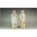 Pair of German Bisque Figures, both dressed in pastiche sailor suits, in 18thC style, the girl