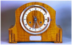 Walnut Cased Mantle Clock, inner chrome chapter ring. Roman Numerals, Plaque to front. 9'' in