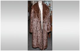 Ladies Brown Three Quarter Length Ermine Coat, fully lined. Hook & Loop fastening with inner tie.