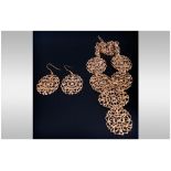 Openwork Panel Statement Necklace and Earrings, the necklace comprising five of the oval, openwork