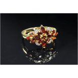 9ct Gold Diamond Dress Ring, Set With A Central Cluster Of Garnets Between Diamond Spacers, Fully