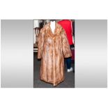 Ladies Full Length Light Brown Mink Coat. Fully Lined. Collar with revers. Label inside reads '