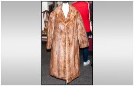 Ladies Full Length Light Brown Mink Coat. Fully Lined. Collar with revers. Label inside reads '