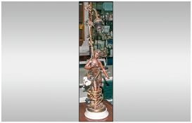 Bronzed Resin Lamp depicting a semi clad lady with a vine leaf. Single branch. 25'' in height.