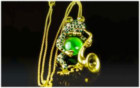 Frog Saxophone Player Pendant or Brooch, the comical frog, of emerald green and white crystals,