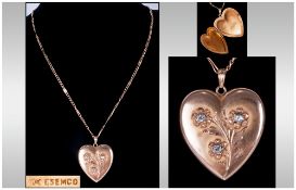 Edwardian Fine 10ct Gold Heart Shaped Locket set with three small Diamonds. Fitted to a 9ct gold