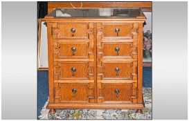 Mock Jacobean Double Door Oak Cupboard the front panelled to simulate a front. On ball feet. The