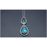 Larimar and Blue Topaz Pear Drop Necklace, comprising a pear cut cabochon of the rare gemstone