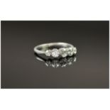 Platinum Diamond Ring Set With 5 Graduating Round Old Cut Diamonds, Estimated Diamond Weight .70ct