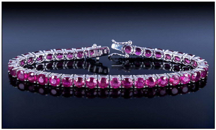 Ruby Tennis Bracelet, 25cts of round cut, rich red rubies set in a continuous line and fastened with - Image 5 of 5
