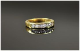 18ct Yellow Gold Channel Set Diamond Ring The diamond of good colour. Est Weight 50pts.  Fully