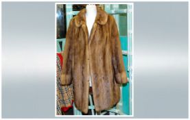 Ladies Light Brown Mink Jacket, fully lined. Button Cuff Sleeves. Collar With Revers. Inner Satin