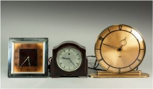Three Mid 20thC Mantle Clocks Comprising An Art Deco Square Clock, Bakelite And A Brass Cased