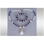 Purple Agate Necklace and Charm Bracelet, the necklace comprising a mixture of purple agate round