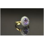 Ladies 9ct Gold Amethyst & Diamond Cluster Ring diamond weigh 25pts. Amethyst of good colour,