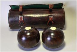 Two Crown Bowls in leather holdall.