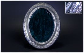 A Silver Oval Shaped Photo Frame. Hallmark Dublin 2001. Stands 6 Inches High. Excellent Condition.