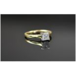18ct Yellow Gold Single Stone Princess Cut Diamond Ring, the single stone diamond of poor clarity.
