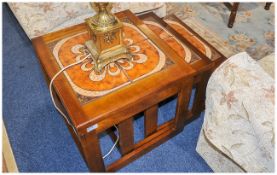 G Plan Style Teak Nest Of Three Tables With A Brown Tiled Top, Supported by a square shaped base.