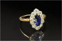 Antique 18ct Gold Set Sapphire and Diamond Cluster Ring. The Central Marquise Cut Sapphire of