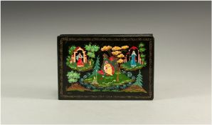 Russian Lacquered Box with hand painted scene to the lid, titled in Cyrillic script, 'Princess