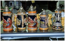 Collection of Five German Stein Tankards, various sizes. Including one musical.